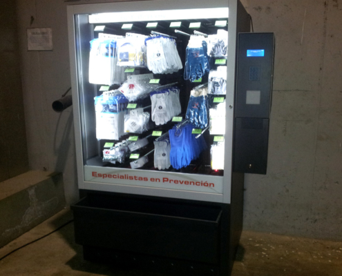 Vending machine for gloves, shoes, disposable overalls and goggles